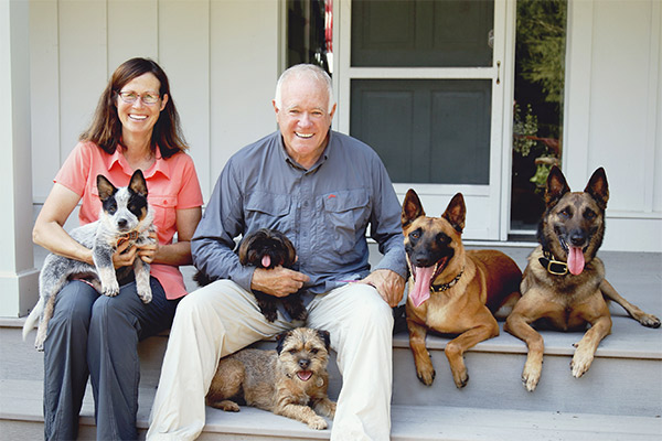 Cindy Rhodes and Ed Frawley with their dogs